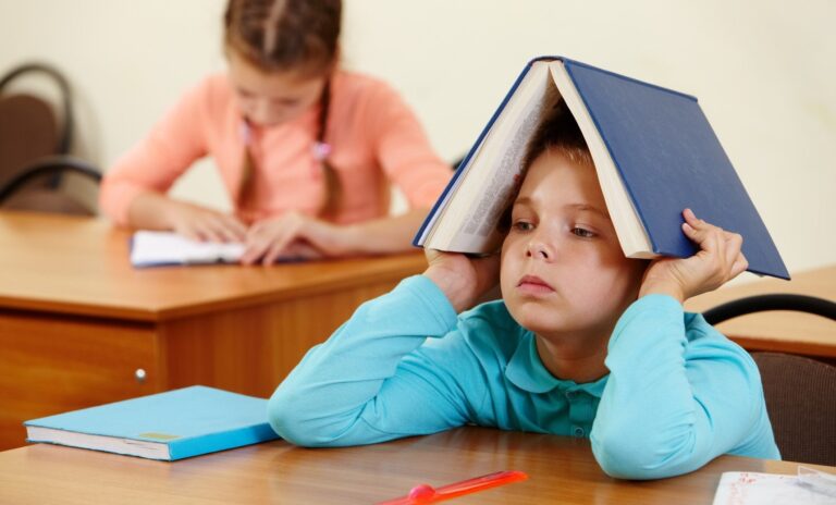1442074586-photodune-828151-boy-with-book-m