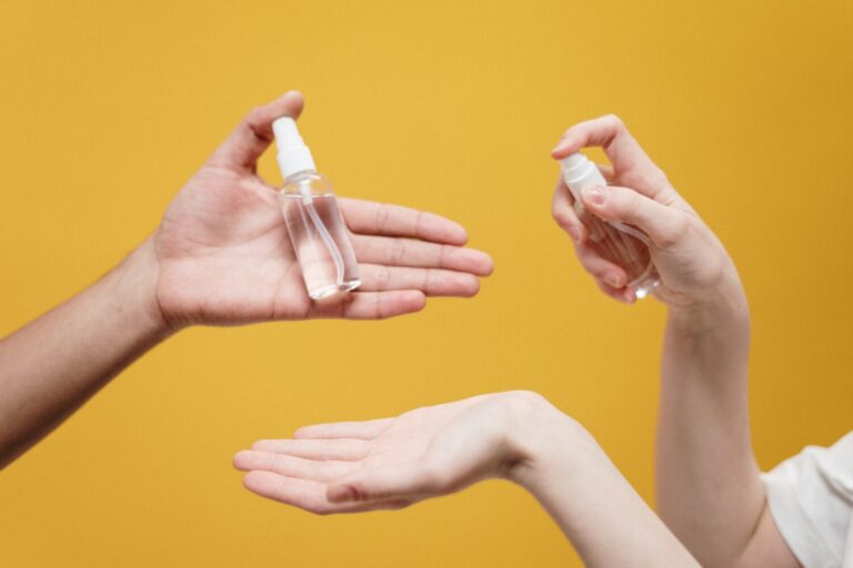 people-holding-clear-glass-bottle-3951862-e1595494469522
