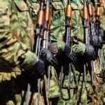 military-force-uniform-soldiers-standing-in-a-row-FTQSNGM-min-scaled