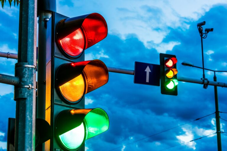 Traffic lights over urban intersection. Red light