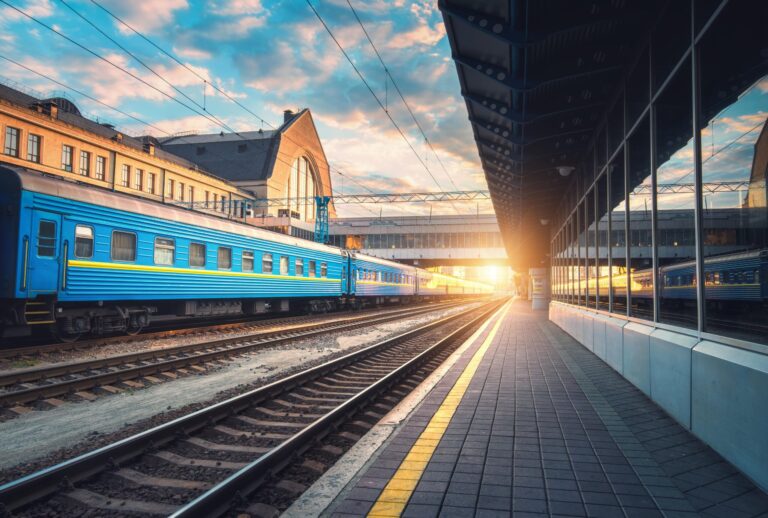 beautiful-blue-passenger-train-at-the-railway-stat-PXJU5XF-min-2-scaled
