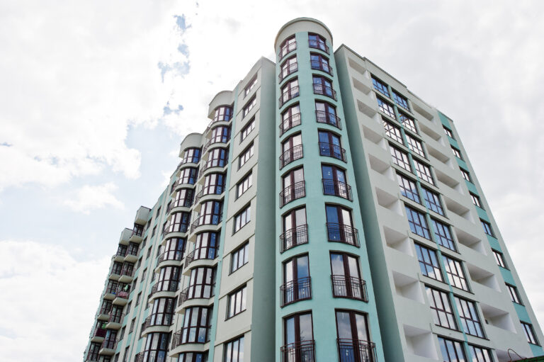 Balcony of new modern turquoise multi storey residential buildin