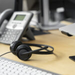 close-up-on-person-working-in-call-center (1)