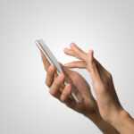 Woman Hand holding smart phone blank screen. Copy space. Hand ho