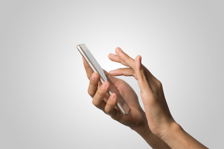 Woman Hand holding smart phone blank screen. Copy space. Hand ho