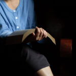 Christian women read the scriptures in the house