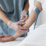 high-angle-health-professional-drawing-blood-for-prp-treatment (1)