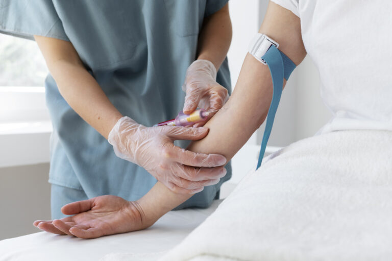 high-angle-health-professional-drawing-blood-for-prp-treatment (1)
