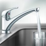 vector-filling-glass-of-water-from-stainless-steel-kitchen-faucet_1284-47997