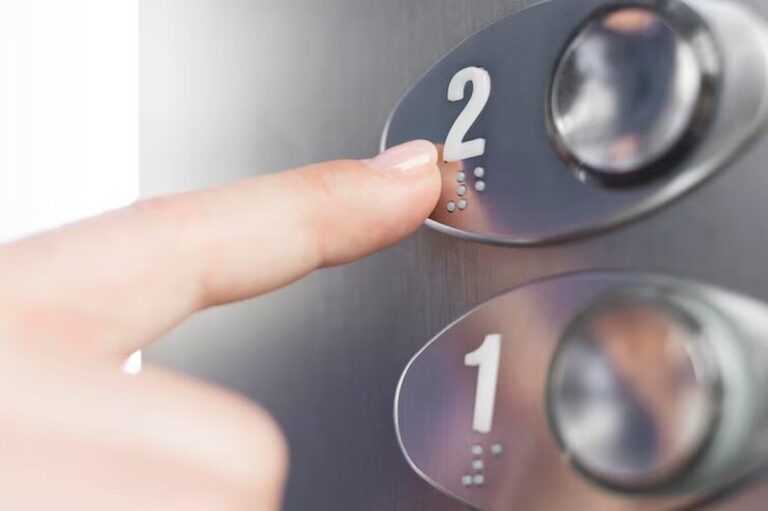 hand-touching-elevator-braille-figure_23-2148718181