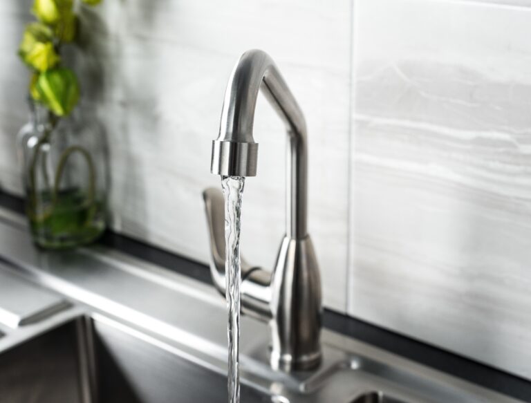 New and  modern steel faucet in the kitchen