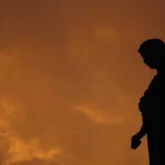 depositphotos_3495621-stock-photo-silhouette-of-an-angel