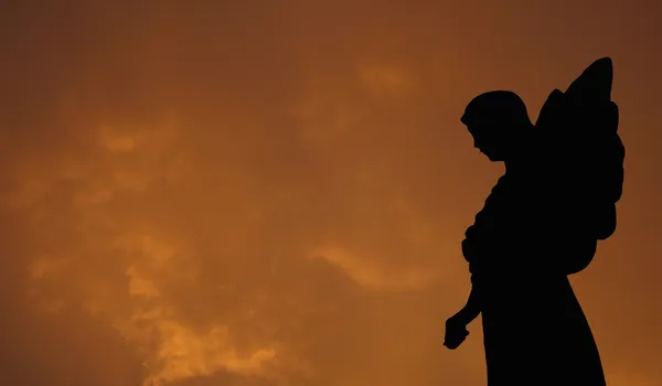 depositphotos_3495621-stock-photo-silhouette-of-an-angel