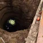 На Вінниччині у вигрібну яму впала 70-річна жінка (фото)